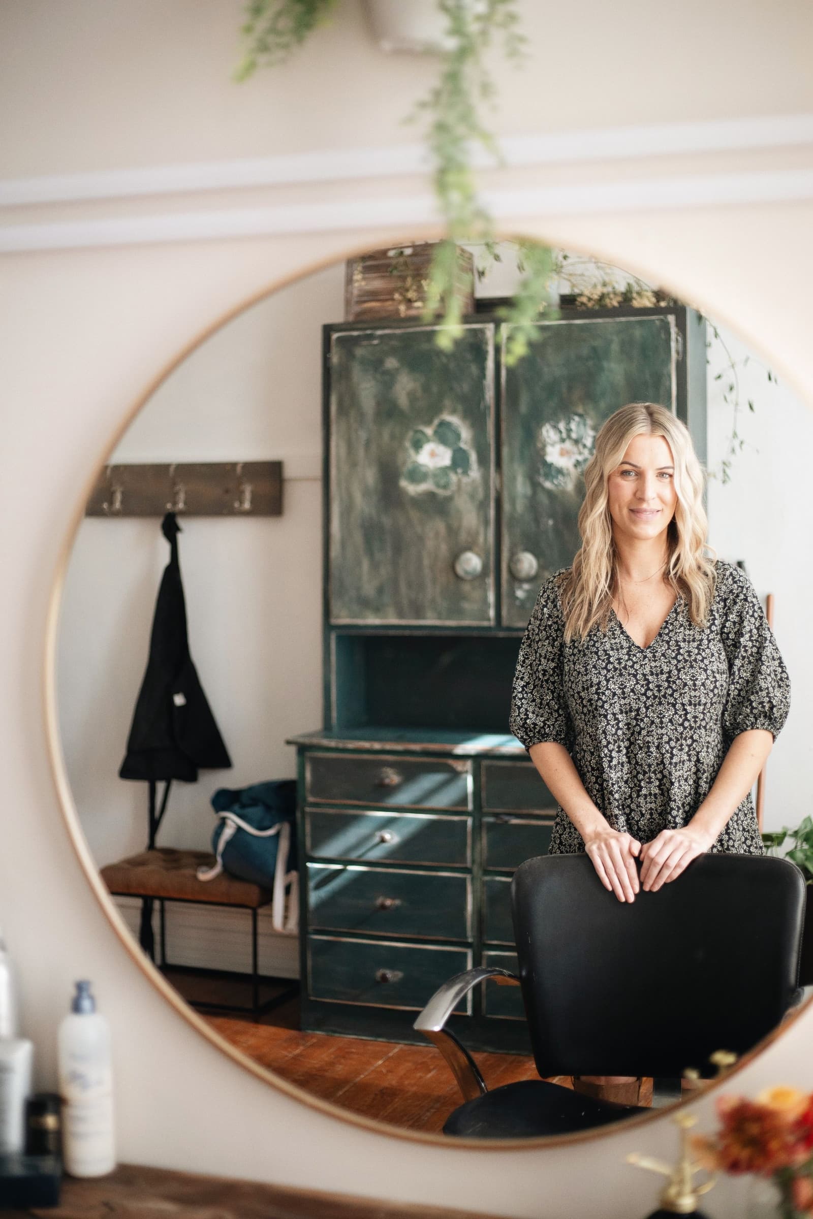 A salon owner photographed in her studio during a personal brand photography session